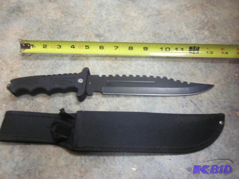 lot 23 image: 14 inch multi purpose knife with sheath. ...