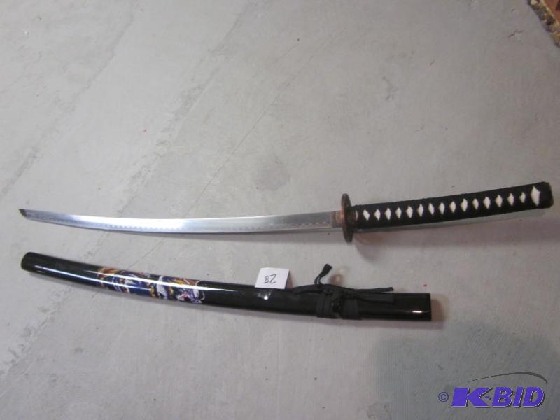 lot 28 image: 39 inch sword with dragon detail and sheath.&...