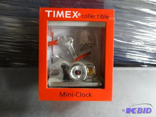 lot 101 image: Timex Collectible Mini Clock...