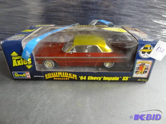lot 130 image: Revell Low Rider Magazine. 64 Chevy Impala SS...