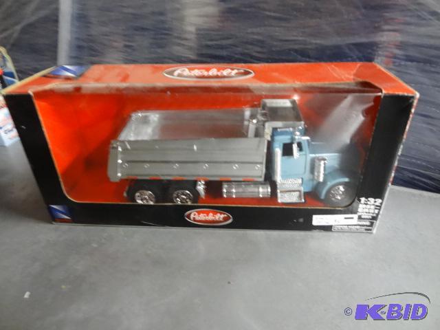 lot 144 image: Peterbilt 132 Dump Truck...
