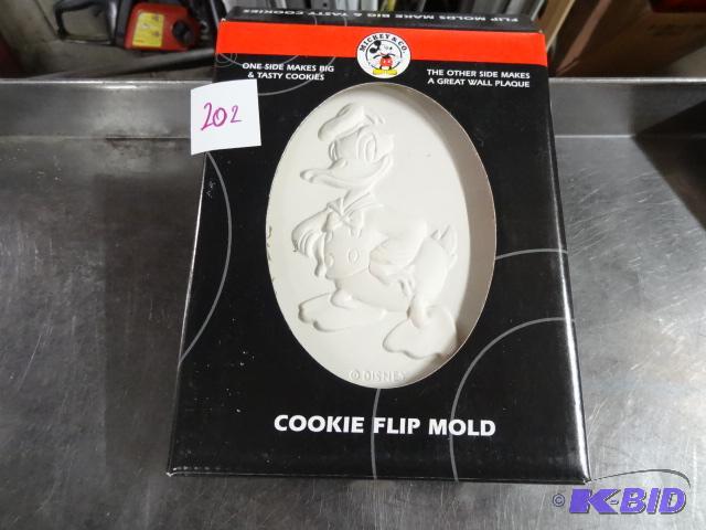 lot 202 image: Ceramic Donald Duck Cookie Mold...