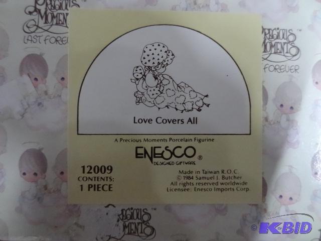 lot 204 image: Precious Moments. Love Covers All Figurine...