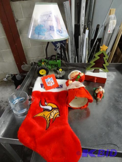 lot 210 image: John Deere Desklamp. Stocking Holder, Vikings...