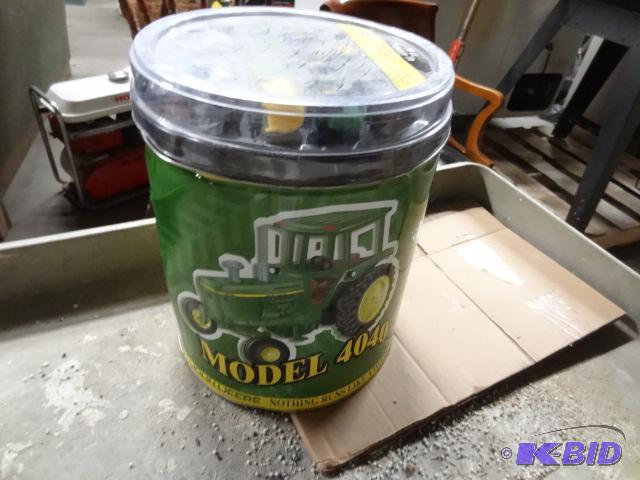 lot 29 image: John Deere Popcorn Tin with Toys in Lid...