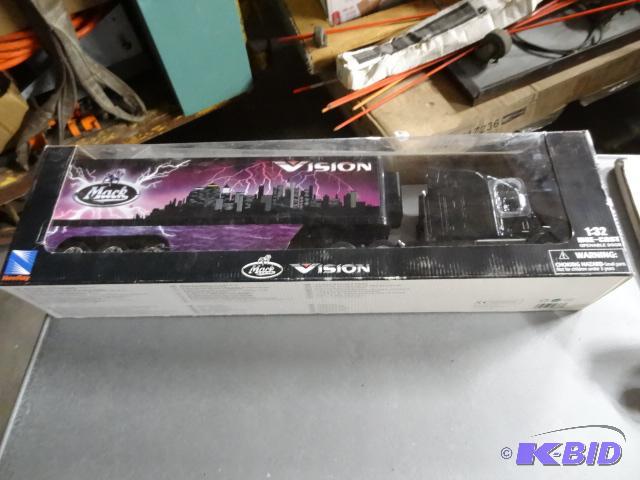 lot 75 image: New Ray Mack Vision133 Die Cast Truck...