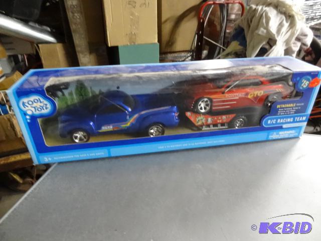 lot 82 image: Kool Toyz RC Racing Team. Remote Truck and ca...
