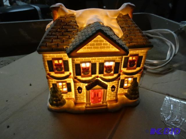 lot 9 image: Trim a Home Premium Porcelain Lighted House...