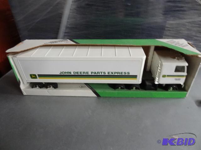 lot 99 image: John Deere Parts Express Semi 124 Scale...