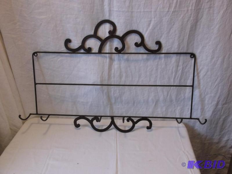 Cute rod iron coat rack measuring 31 12&quot...