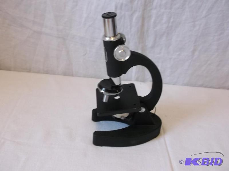 Vintage microscope with original box nice col...