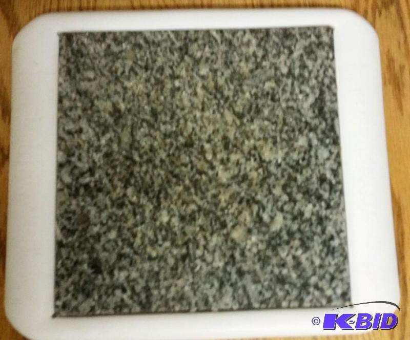 lot 71 image: Microwaveable Trivet for heating on the table...
