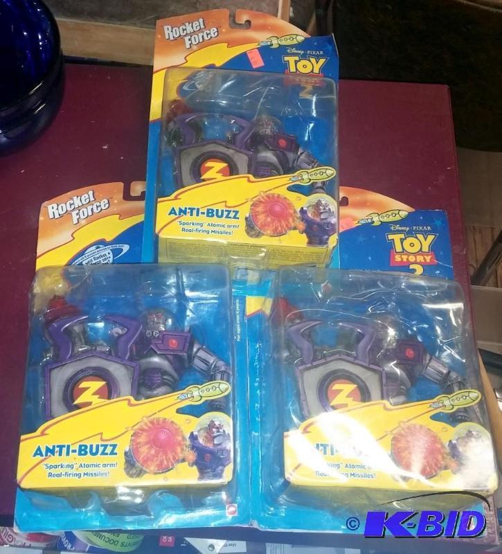 lot 74 image: Lot of 3 NEW Disney Pixar Anti-Buzz Toy...