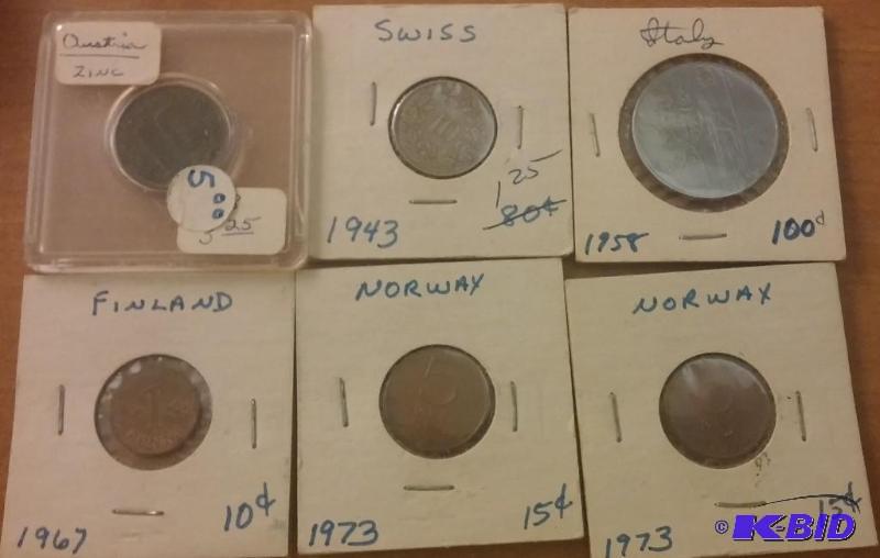 Large lot of Foreign coins on cards...