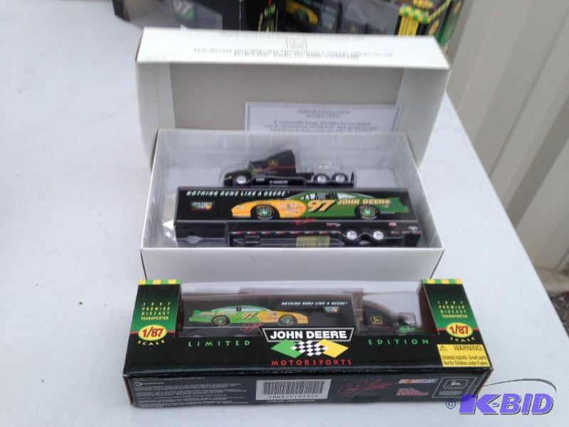 lot 106 image: Two John Deere Nacar Haulers