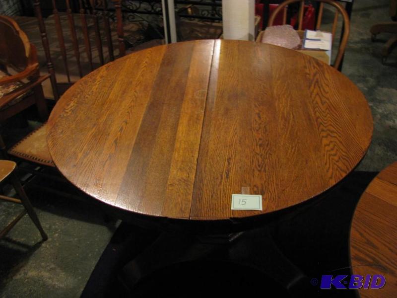 lot 15 image: antique 48" oak Dining room table golden...