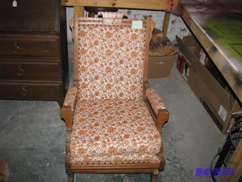 lot 57 image: vintage Eastlake style rocking chair. The mat...