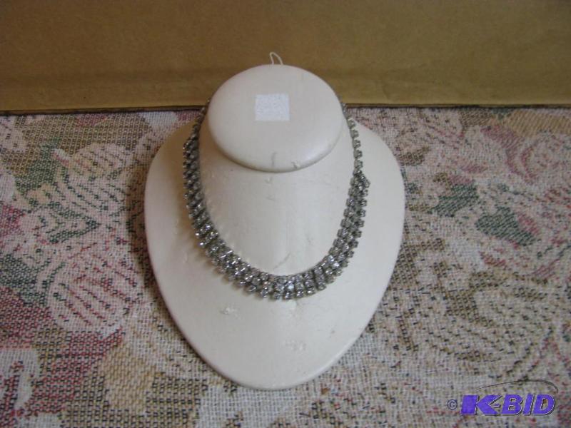 lot 95 image: rhinestone necklace and the display piece...