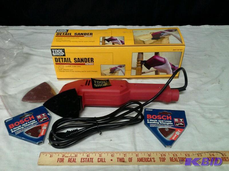 lot 18 image: Tool Shop detail sander includes 5 piece sanding triangle assortment