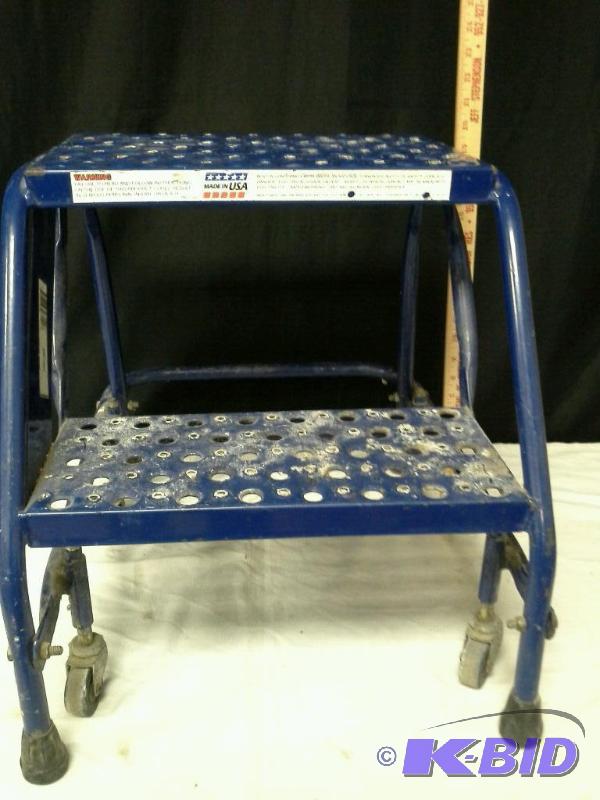 lot 20 image: Louisville steel warehouse ladder. Rolling 2 step ladder