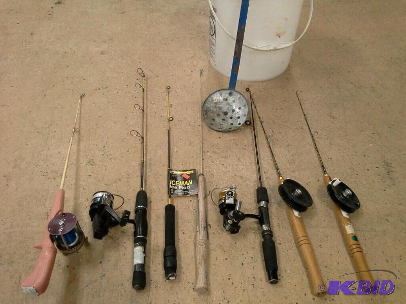 lot 26 image: Lots of rods and reels for ice fishing plus a scoop.