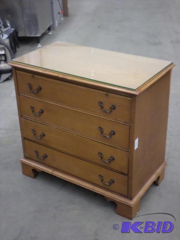 lot 64 image: 4-Drawer Wood Dresser With Glass Top...