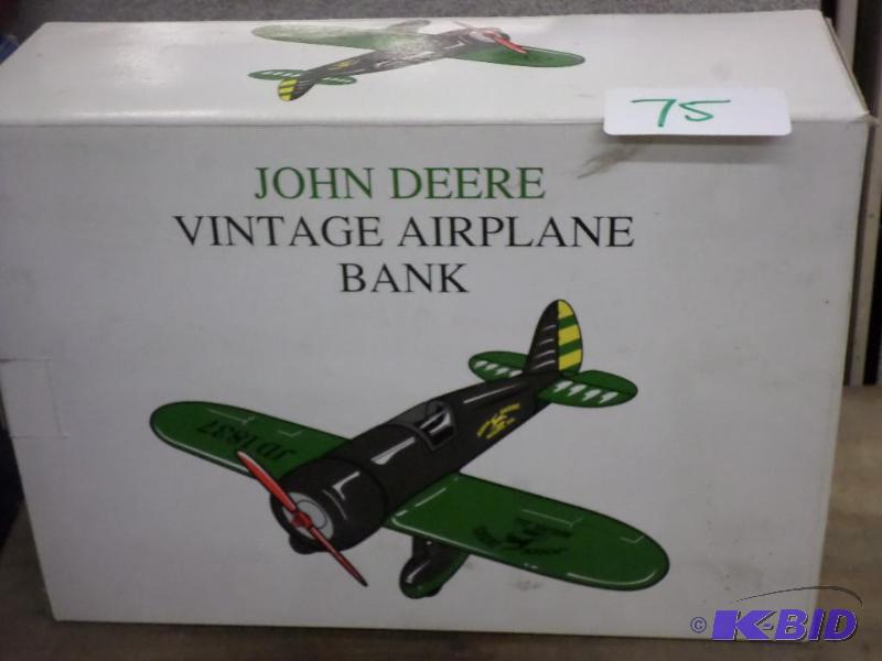 lot 75 image: John Deere Vintage Airplane Bank...