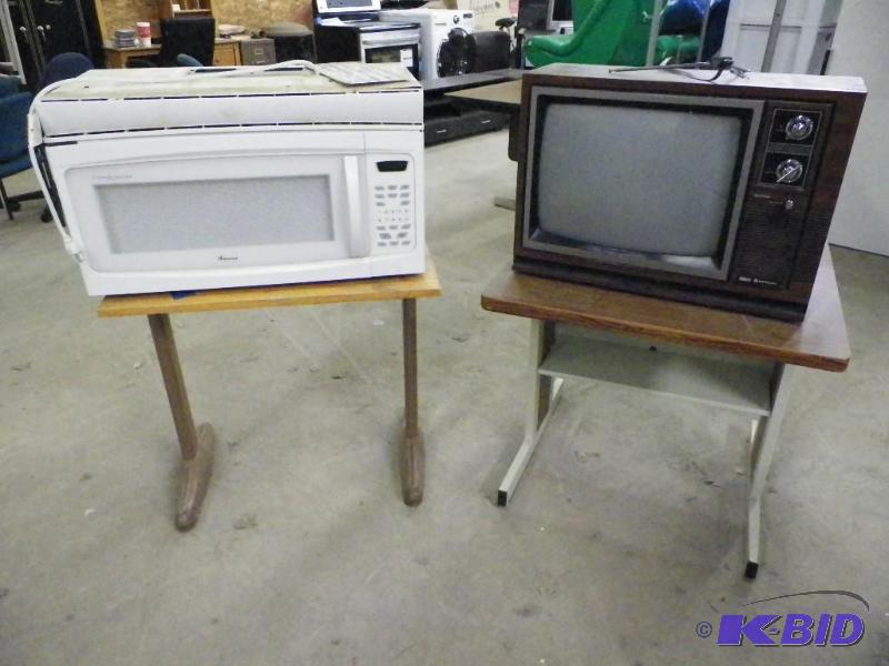 lot 262 image: Over the Range Microwave and Console TV