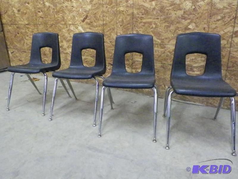 lot 69 image: Black student chairs