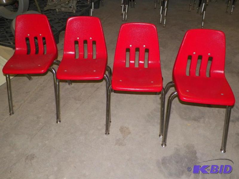 lot 81 image: Red student chairs