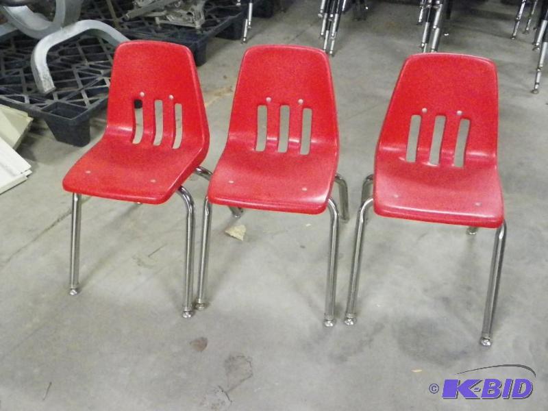 lot 82 image: Red student chairs