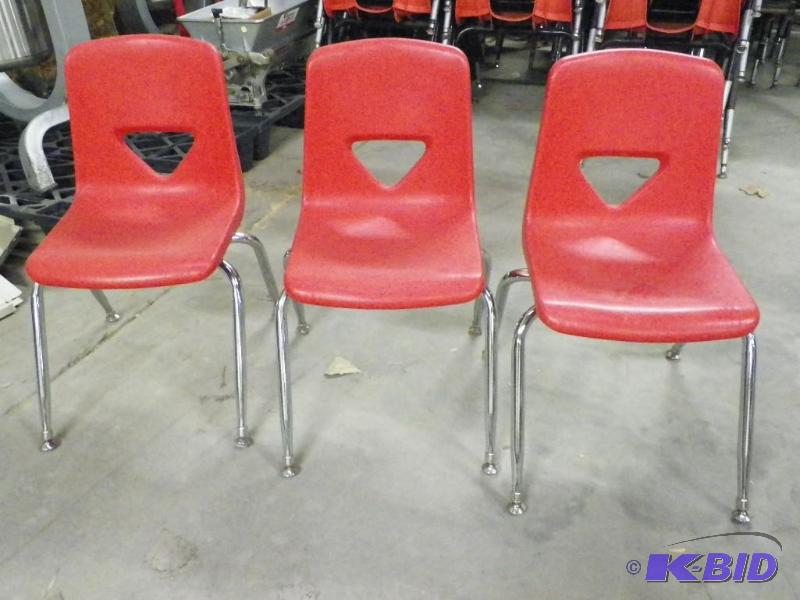 lot 87 image: Red student chairs