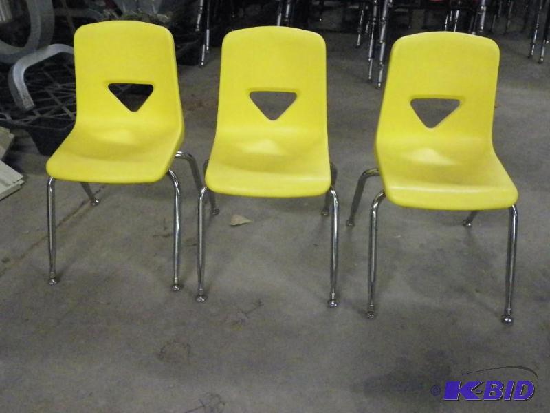 lot 94 image: Yellow student chairs
