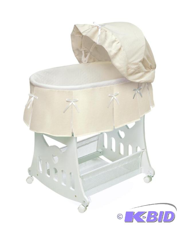 lot 17 image: Badger Basket Portable Bassinet n Cradle with Toybox Base, Ecru