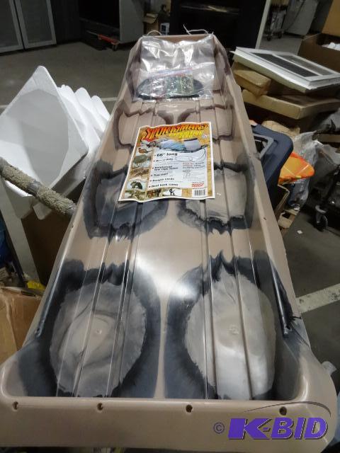 lot 57 image: New Sportsmans expedition sled. 66 inches lon...