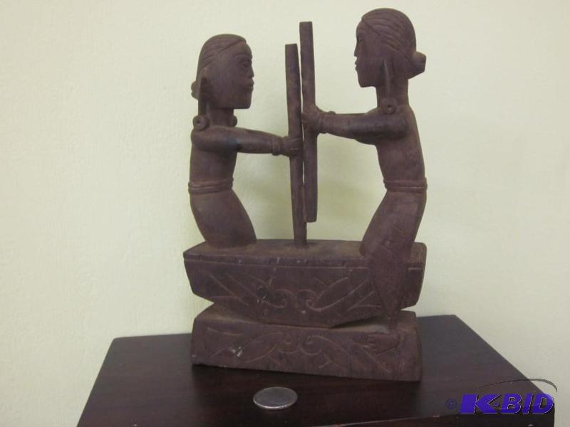 lot 17 image: Vintage hand carved solid wood ethnic carving...