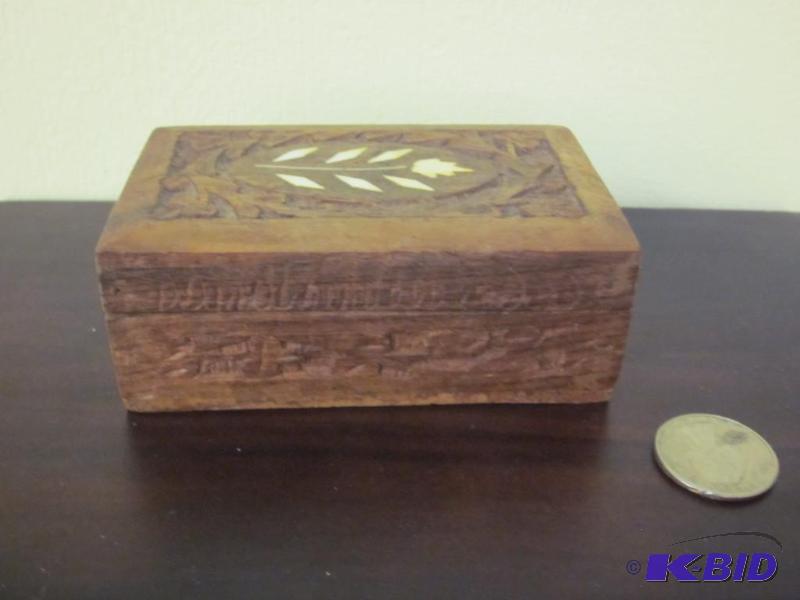 lot 21 image: Small hand carved wooden box with bone inlay....