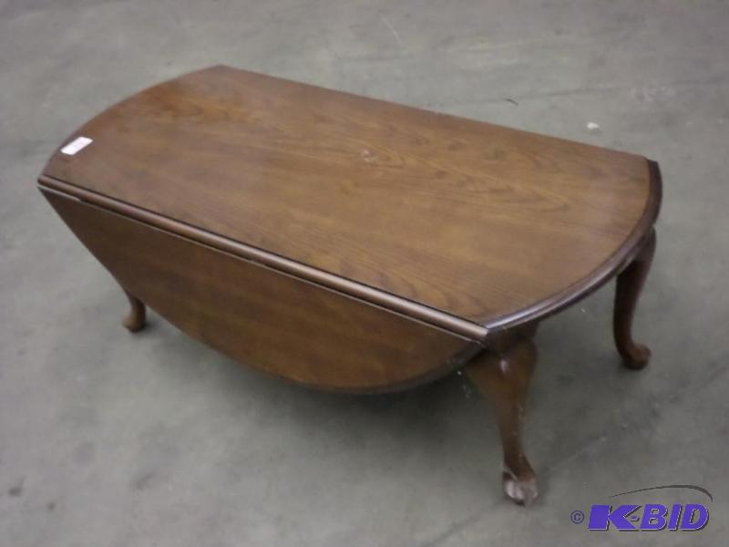 lot 114 image: 48" Oak Coffee Table With Fold-Down Side...