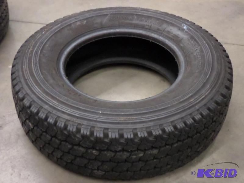 lot 48 image: Like New Bridgestone LT2457516 Tire...
