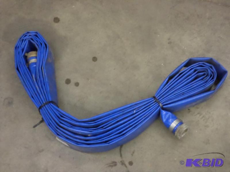 lot 75 image: Lightly Used 50ft Trash Pump Hose...