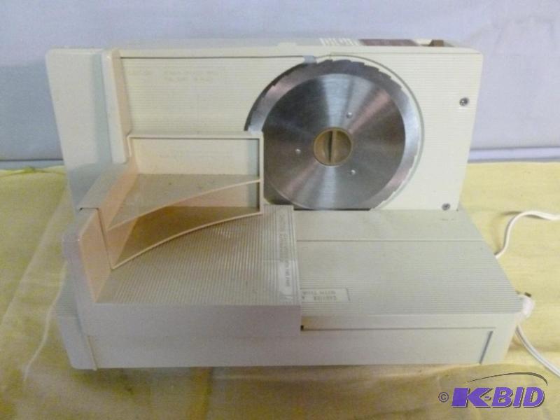 lot 106 image: Montgomery Ward electric meat slicer, tested ...