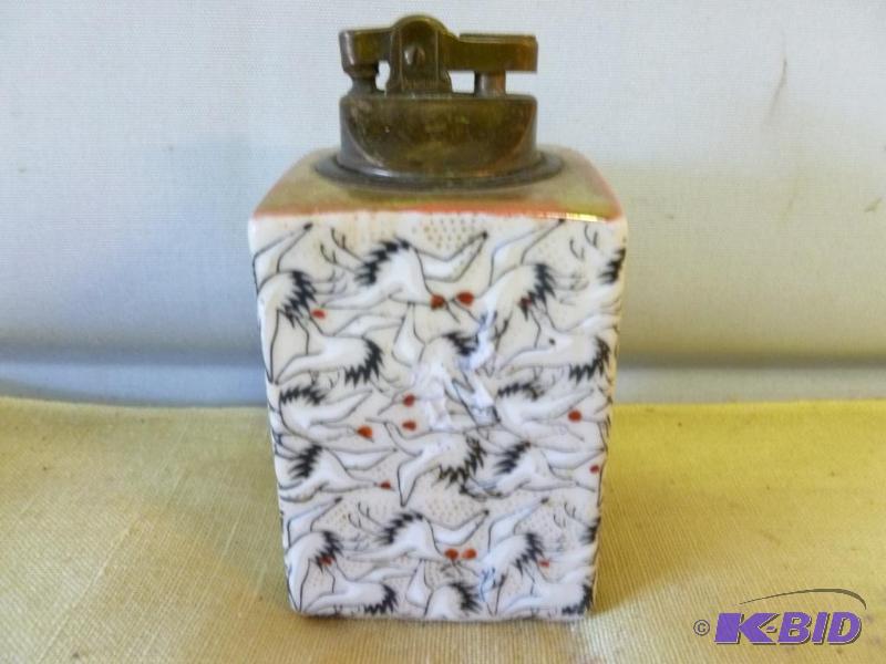 lot 157 image: Vintage Penguin porcelain and brass cigarette...