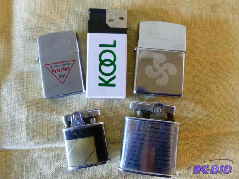 lot 160 image: Lot of five collector lighters. ...