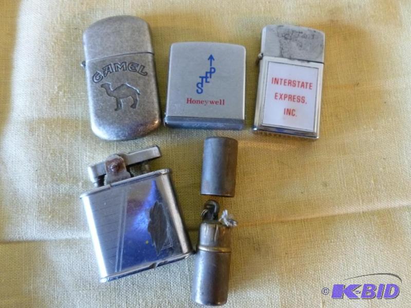 lot 161 image: Lot of four collector lighters and a Zippo - ...