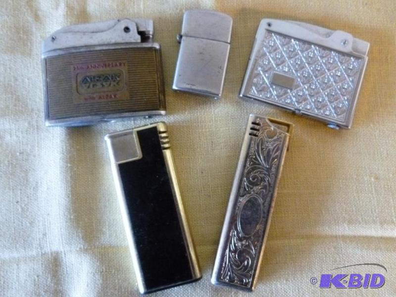 lot 162 image: Lot of five collector lighters. ...