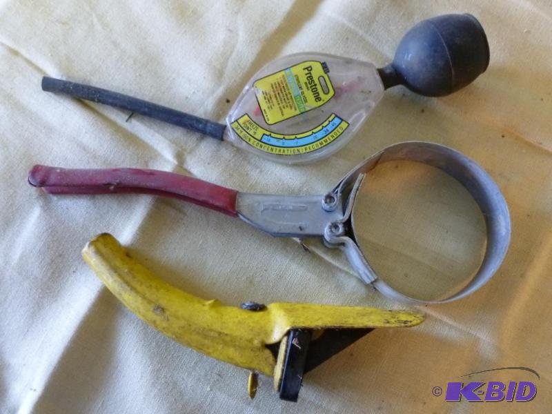 lot 204 image: This lot consists of a metal oil can spout, o...