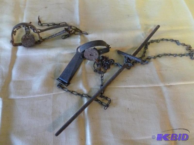 lot 229 image: Lot of two leg traps with chain, one of them ...