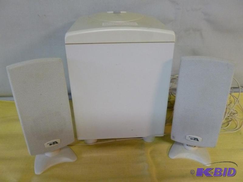 lot 40 image: CA three piece speaker system that includes a...