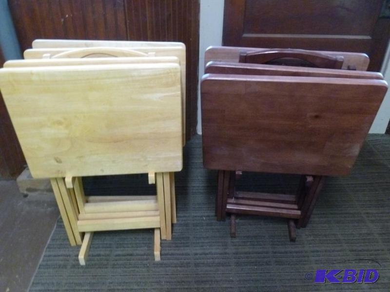 lot 41 image: Two sets of solid wood T.V trays and stands, ...