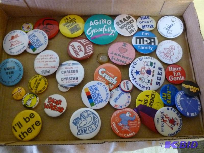 lot 65 image: Large lot of collectible pin back buttons....